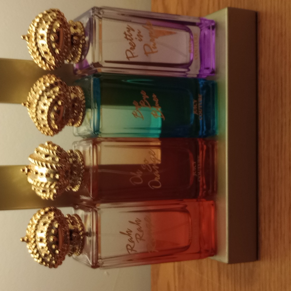 Four 2.5 fl.oz juicy couture perfume sprays